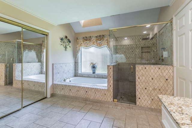 2111 Menton Pl, Carrollton, TX 75006 - bathroom with vanity, a garden tub, a shower stall, crown molding, and stone tile flooring