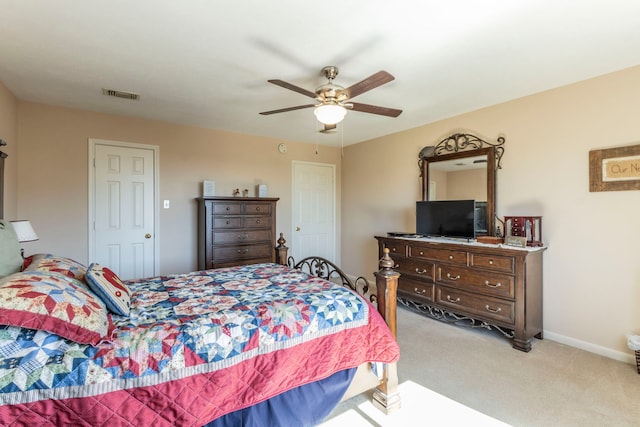 2111 Menton Pl, Carrollton, TX 75006 - bedroom with light colored carpet, ceiling fan, and baseboards