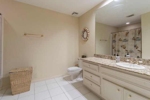 2111 Menton Pl, Carrollton, TX 75006 - bathroom with vanity, toilet, tile patterned flooring, baseboards, and a shower with shower curtain