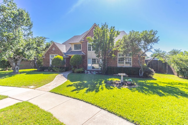 2111 Menton Pl, Carrollton, TX 75006 - traditional-style home with brick siding and roof with shingles