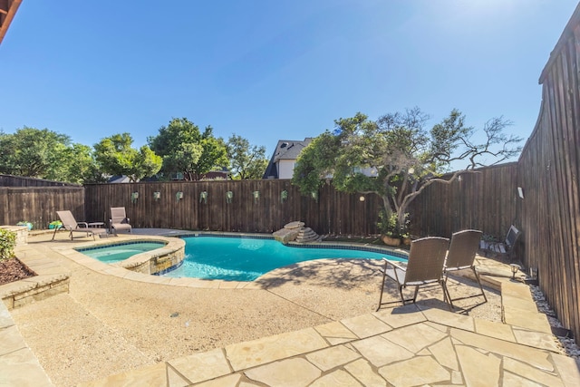 2111 Menton Pl, Carrollton, TX 75006 - view of pool featuring a patio, a fenced backyard, and a pool with connected hot tub
