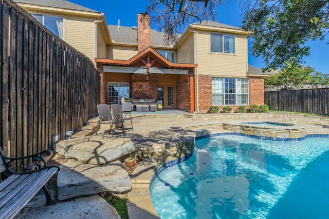 2111 Menton Pl, Carrollton, TX 75006 - view of pool with a patio, an outdoor living space, a fenced backyard, and a pool with connected hot tub