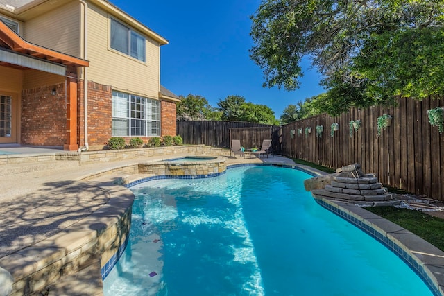 2111 Menton Pl, Carrollton, TX 75006 - view of swimming pool with a patio, a fenced backyard, and a pool with connected hot tub