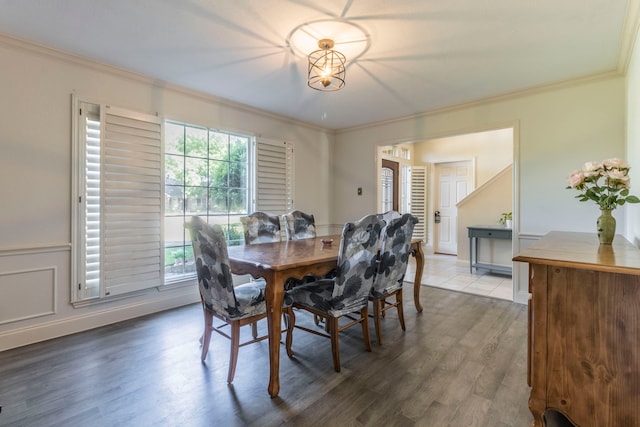 2111 Menton Pl, Carrollton, TX 75006 - dining space with wood finished floors and ornamental molding