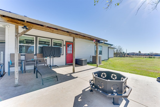 430 Hornik Rd, Ennis, TX 75119 - view of patio / terrace featuring a fire pit and central air condition unit