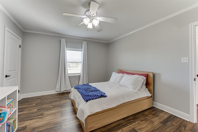 430 Hornik Rd, Ennis, TX 75119 - bedroom with dark wood finished floors, crown molding, baseboards, and ceiling fan