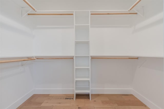 702 Graham Ave, Dallas, TX 75223 - spacious closet with wood finished floors