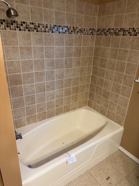 401 Locust St, Shreveport, LA 71105 - full bath featuring tile patterned floors, baseboards, and bathing tub / shower combination