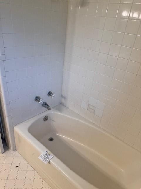 401 Locust St, Shreveport, LA 71105 - bathroom featuring tile patterned floors and shower / bathtub combination