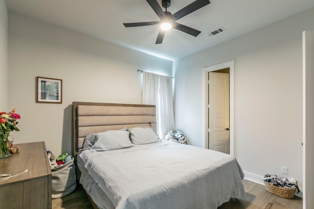 2104 Palafox Dr, Waco, TX 76655 - bedroom with wood finished floors, baseboards, and a ceiling fan