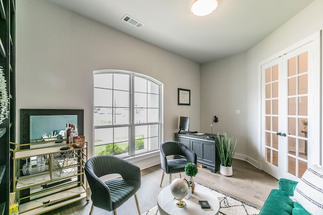 2104 Palafox Dr, Waco, TX 76655 - office with french doors, wood finished floors, and baseboards