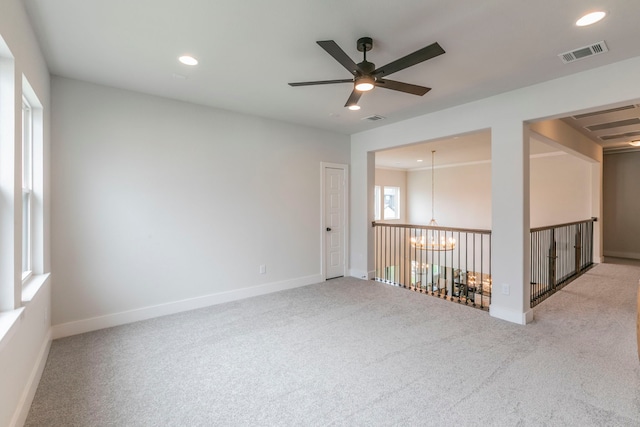2104 Palafox Dr, Waco, TX 76655 - unfurnished room with carpet, ceiling fan, a chandelier, recessed lighting, and baseboards