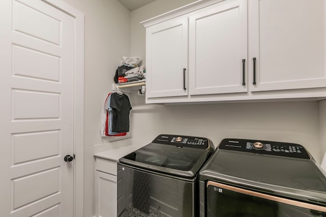 2104 Palafox Dr, Waco, TX 76655 - laundry area with washer and clothes dryer and cabinet space