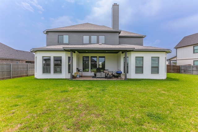 2104 Palafox Dr, Waco, TX 76655 - back of house with a patio, a chimney, roof with shingles, and brick siding