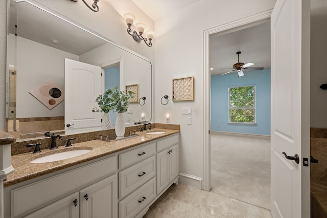 33 Main St Unit 220, Colleyville, TX 76034 - full bath with double vanity, ceiling fan, and baseboards