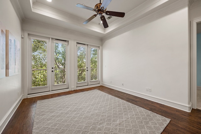 33 Main St Unit 220, Colleyville, TX 76034 - unfurnished room featuring dark wood-style floors, crown molding, baseboards, a ceiling fan, and a raised ceiling