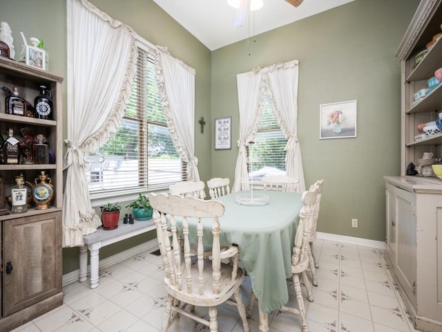 306 E Tarrant St, Bowie, TX 76230 - dining space featuring ceiling fan and baseboards