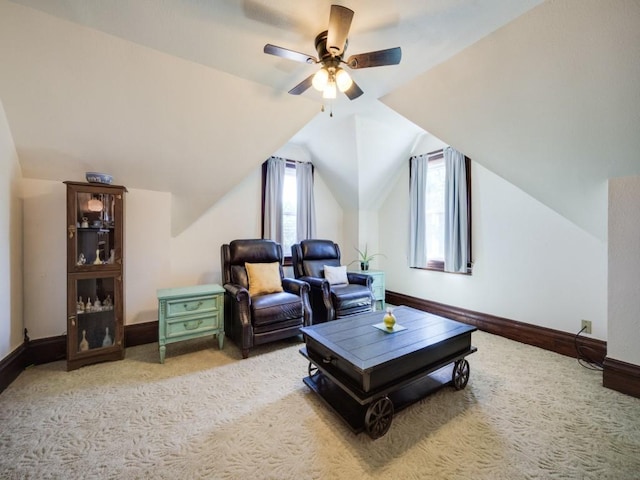306 E Tarrant St, Bowie, TX 76230 - living area featuring a ceiling fan, baseboards, vaulted ceiling, and carpet flooring