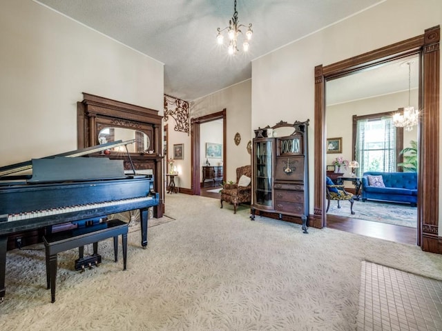 306 E Tarrant St, Bowie, TX 76230 - sitting room with a chandelier and carpet floors