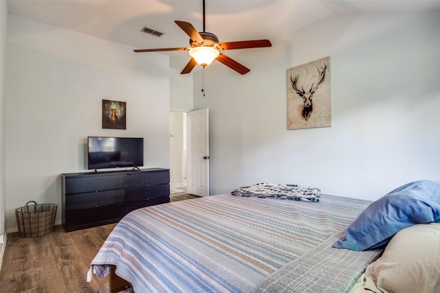 226 Merlin Dr, Weatherford, TX 76086 - bedroom with lofted ceiling, wood finished floors, ceiling fan, and baseboards