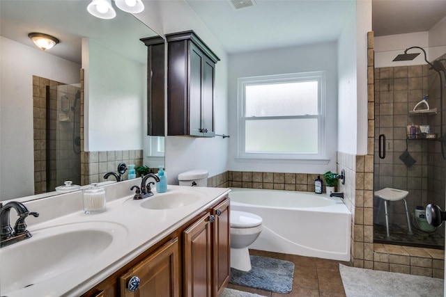 226 Merlin Dr, Weatherford, TX 76086 - bathroom with toilet, a stall shower, a garden tub, double vanity, and tile patterned floors