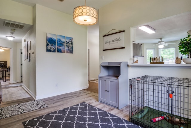 226 Merlin Dr, Weatherford, TX 76086 - kitchen featuring ceiling fan, light wood-type flooring, and baseboards
