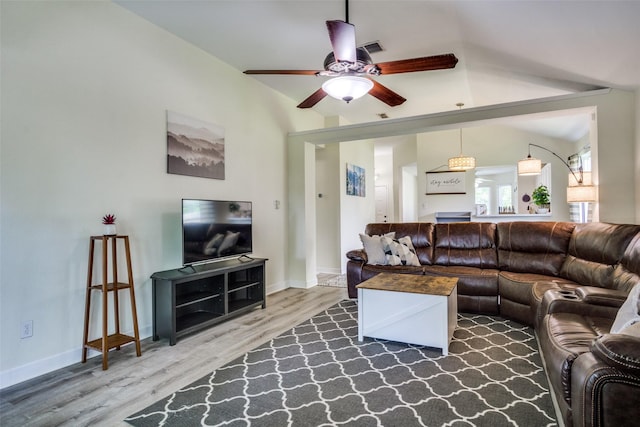 226 Merlin Dr, Weatherford, TX 76086 - living room with vaulted ceiling, wood finished floors, a ceiling fan, and baseboards