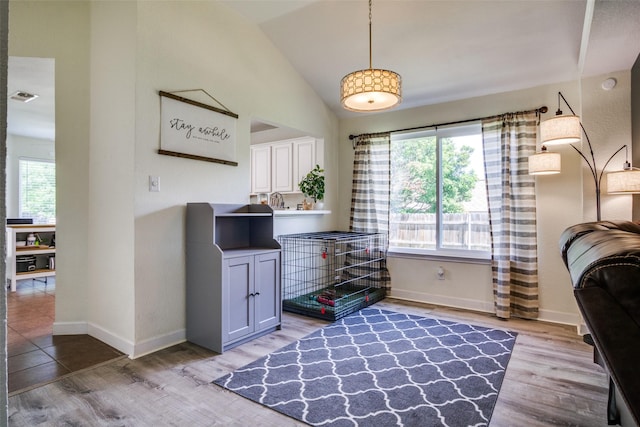 226 Merlin Dr, Weatherford, TX 76086 - home office featuring wood finished floors, baseboards, and high vaulted ceiling