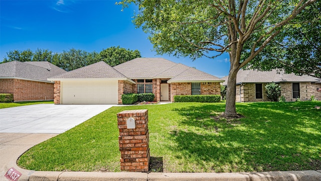 137 Sunny Meadows Dr, Burleson, TX 76028 - view of front of house featuring a garage, concrete driveway, a front lawn, and brick siding