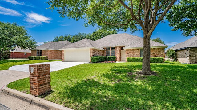 137 Sunny Meadows Dr, Burleson, TX 76028 - view of front facade featuring driveway, an attached garage, a front lawn, and brick siding