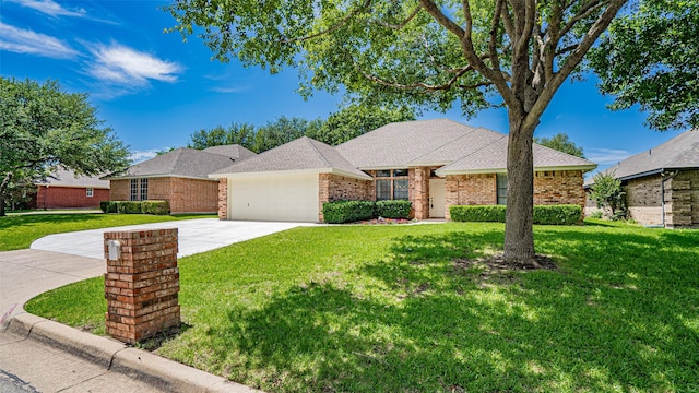 137 Sunny Meadows Dr, Burleson, TX 76028 - view of front facade featuring driveway, an attached garage, a front lawn, and brick siding
