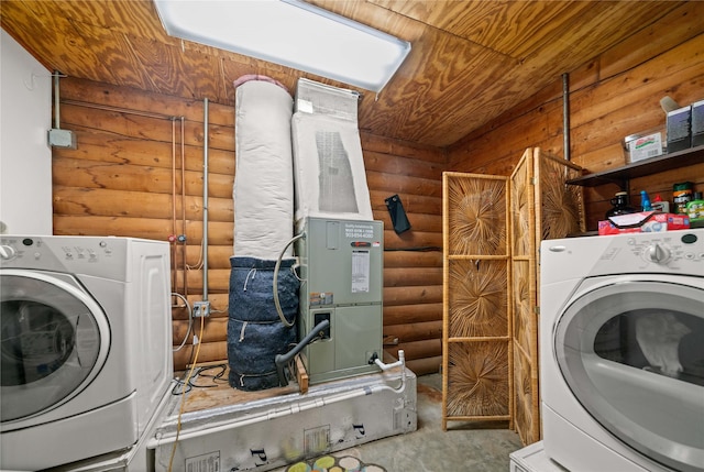 225 Springwood Cir, Chandler, TX 75758 - laundry room featuring washer / clothes dryer and rustic walls
