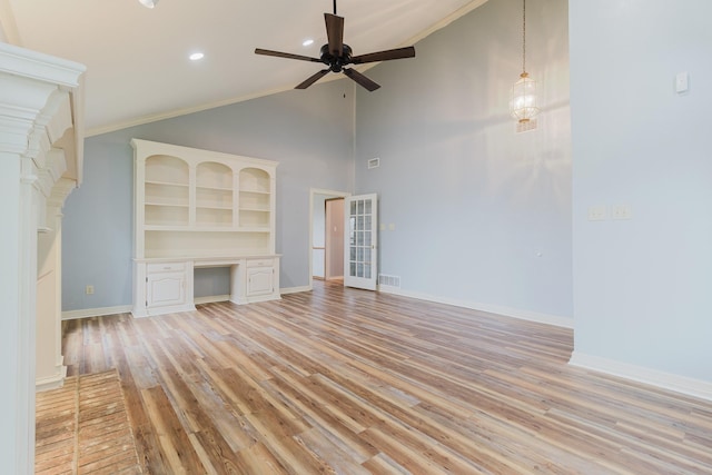1103 Bluebonnet Hill Dr, Ennis, TX 75119 - unfurnished living room with built in desk, light wood finished floors, ceiling fan, recessed lighting, and high vaulted ceiling