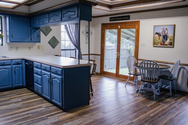 1103 Bluebonnet Hill Dr, Ennis, TX 75119 - kitchen with blue cabinets, a peninsula, french doors, dark wood-type flooring, and ornamental molding