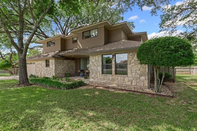 5120 Fairway Cir, Granbury, TX 76049 - view of front facade featuring stone siding, a garage, driveway, and a shingled roof