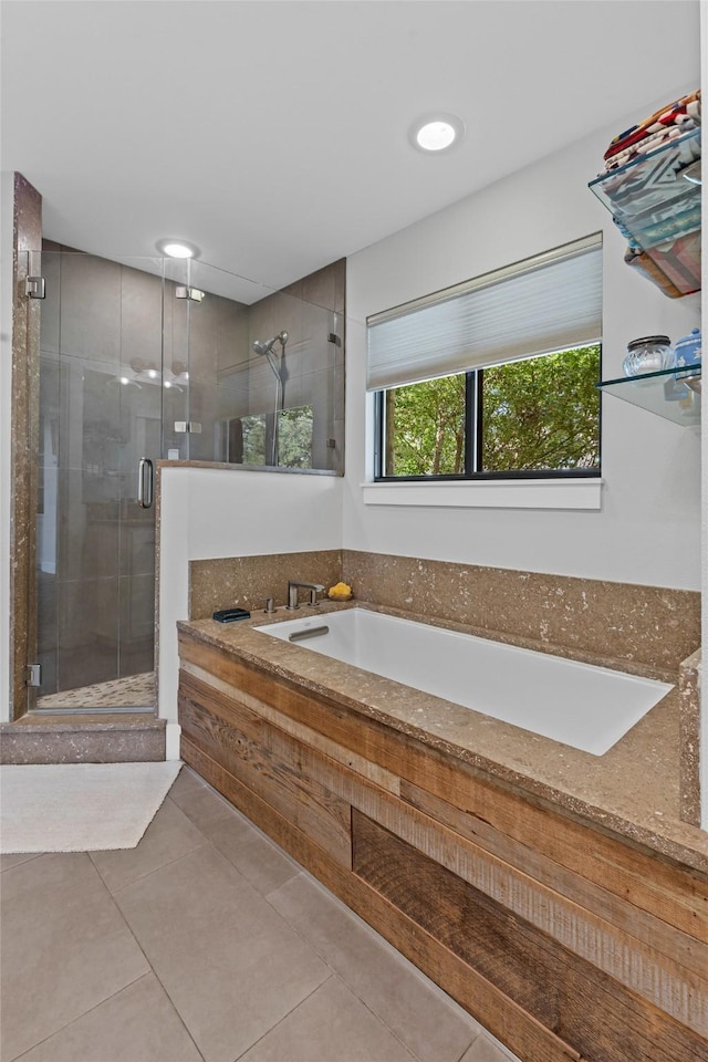 5120 Fairway Cir, Granbury, TX 76049 - full bath featuring a garden tub, a stall shower, and tile patterned floors