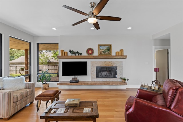 5120 Fairway Cir, Granbury, TX 76049 - living room featuring ceiling fan, a high end fireplace, recessed lighting, and wood finished floors