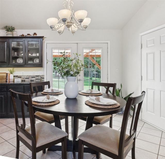 1000 Ballard Rd, Van Alstyne, TX 75495 - dining area featuring light tile patterned floors and a chandelier