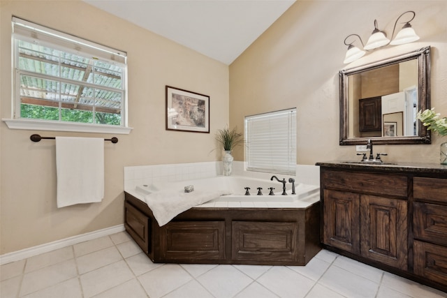 1000 Ballard Rd, Van Alstyne, TX 75495 - bathroom with vanity, a garden tub, tile patterned flooring, and baseboards