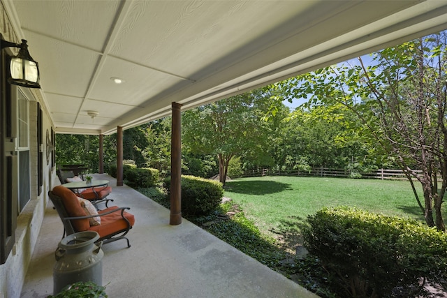 1000 Ballard Rd, Van Alstyne, TX 75495 - view of yard with view of wooded area and a porch