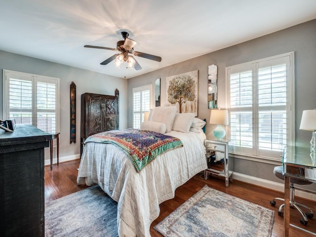 879 Peavy Rd, Dallas, TX 75218 - bedroom with wood finished floors, baseboards, and ceiling fan