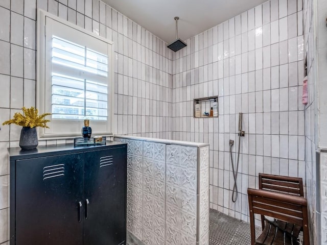 879 Peavy Rd, Dallas, TX 75218 - bathroom featuring tile walls and a walk in shower