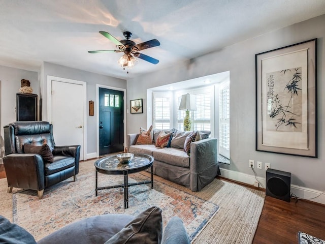 879 Peavy Rd, Dallas, TX 75218 - living area with baseboards, wood finished floors, and ceiling fan