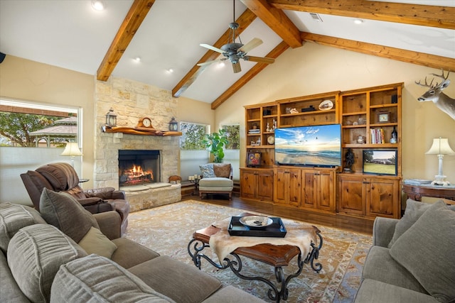1096 Black Hawk Trl, Nemo, TX 76070 - living room featuring wood finished floors, beamed ceiling, a stone fireplace, ceiling fan, and high vaulted ceiling