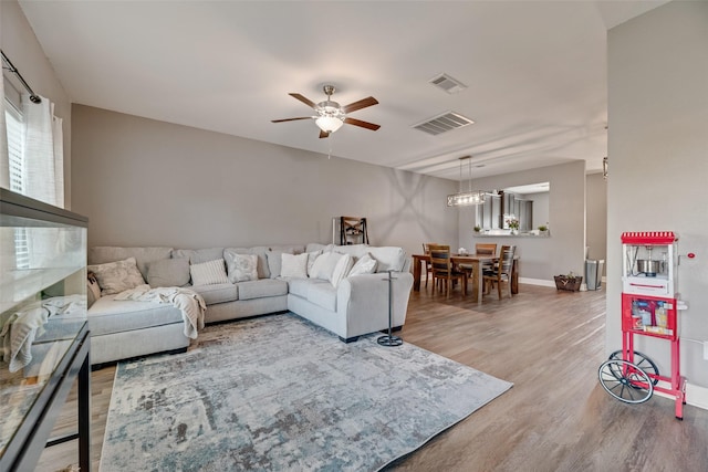 2211 Barrow St, Princeton, TX 75407 - living room with light wood-style floors and ceiling fan