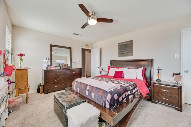 2211 Barrow St, Princeton, TX 75407 - bedroom with light carpet, baseboards, and a ceiling fan