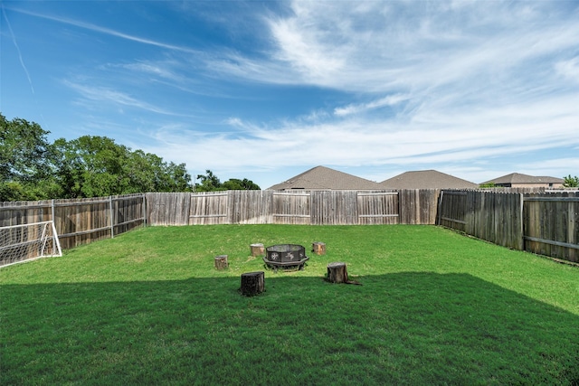 2211 Barrow St, Princeton, TX 75407 - view of yard featuring an outdoor fire pit