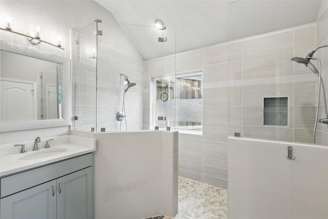 1137 Countryhill Dr, Keller, TX 76248 - bathroom featuring a walk in shower, vanity, and lofted ceiling