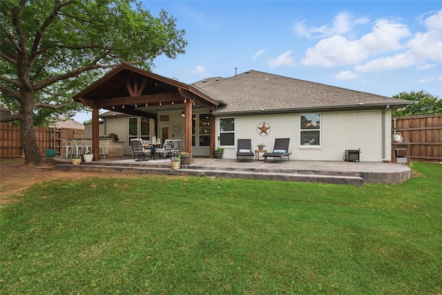 1137 Countryhill Dr, Keller, TX 76248 - rear view of property with roof with shingles, brick siding, and a patio