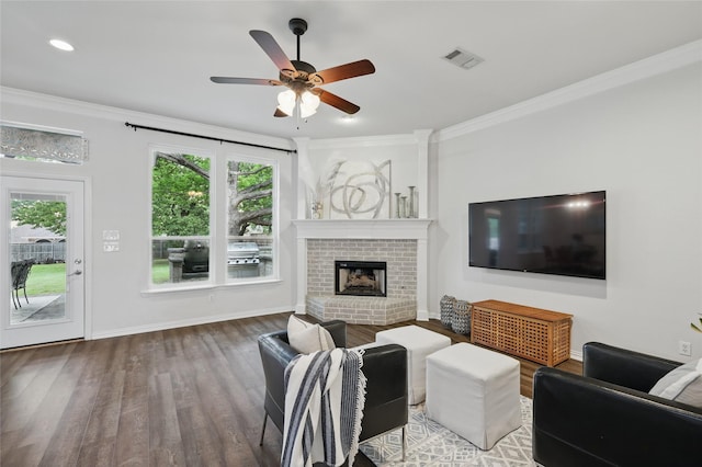 1137 Countryhill Dr, Keller, TX 76248 - living room with ornamental molding, a ceiling fan, wood finished floors, a brick fireplace, and baseboards